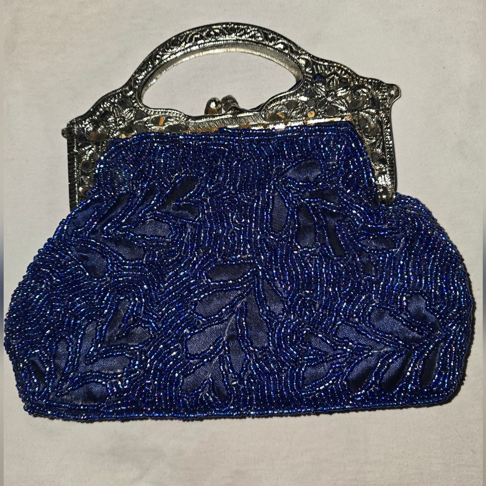 elegant vintage handbag with blue rhinestones